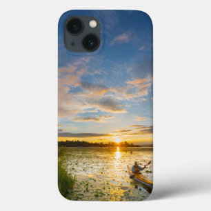 Male kayaker paddling sea kayak on still water iPhone 13 case