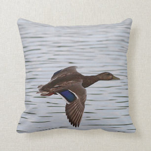 Mallard duck in flight throw pillow