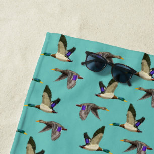Mallard ducks in flight beach towel