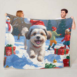 Malti Tzu Running in Snow with Christmas Hat Fleece Blanket