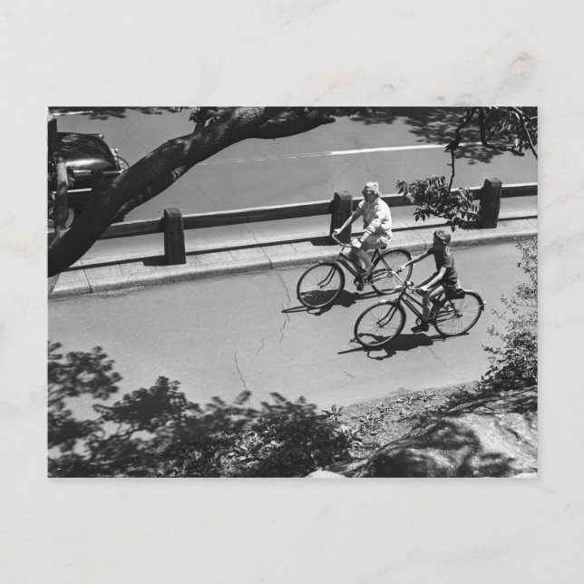 Man and Boy Cycling Postcard (Front)