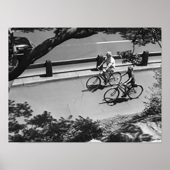 Man and Boy Cycling Poster (Front)