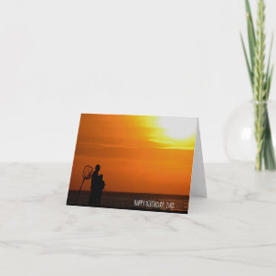 Man and son silhouette at sunset birthday card
