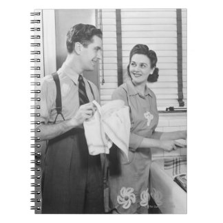 Man and Woman Doing Dishes Notebook