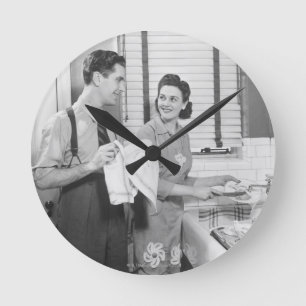 Man and Woman Doing Dishes Round Clock
