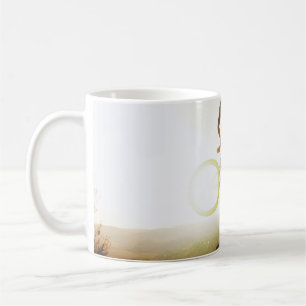 Man carrying bike coffee mug