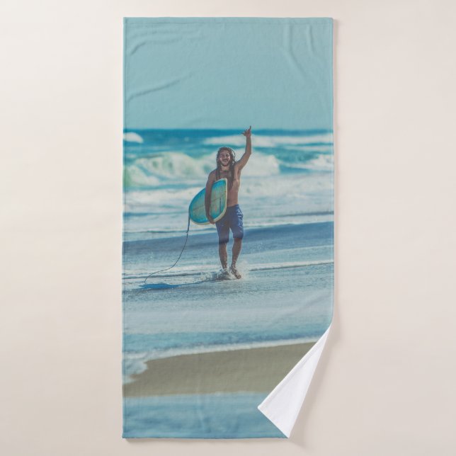 Man carrying surfboard at beach bath towel (Bath Towel)