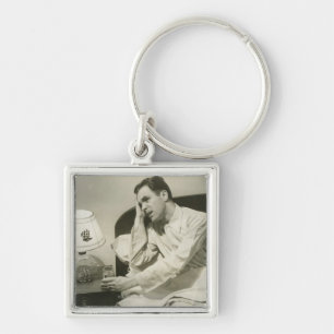 Man Drinking Water Keychain