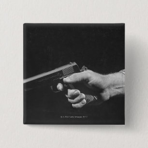 Man Holding Gun 2 Inch Square Button