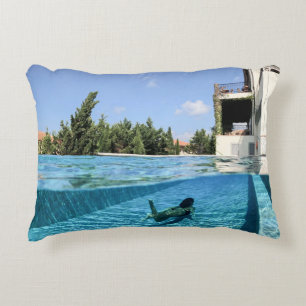 Man in swimming pool in the morning accent pillow