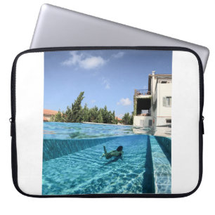 Man in swimming pool in the morning laptop sleeve