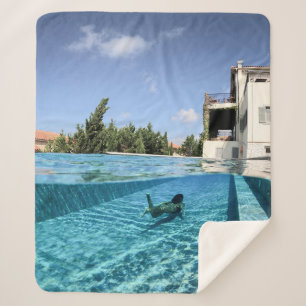 Man in swimming pool in the morning sherpa blanket