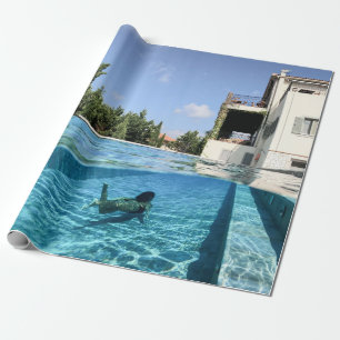 Man in swimming pool in the morning wrapping paper