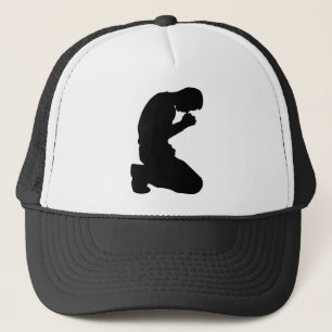 MAN KNEELING IN PRAYER TRUCKER HAT