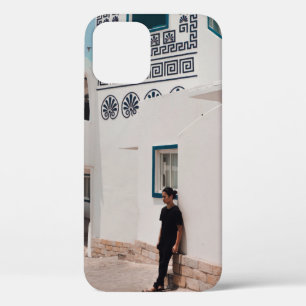 Man lean on concrete house iPhone 12 case