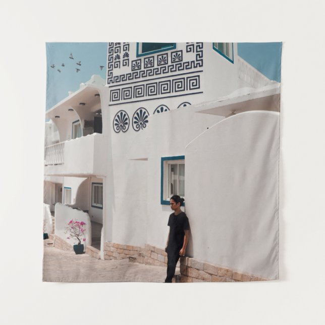 Man lean on concrete house tapestry (Front)