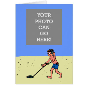 Man Metal Detecting Beach