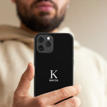 Man monogram name personalized simple black  iPhone 15 case<br><div class="desc">Modern simple masculine looking stylish iPhone case with black and white trendy typography (changeable colours).            Personalized gift for him: dad,  father,  husband,  son,  boyfriend,  groom,  best man,  groomsman,  business executive.</div>