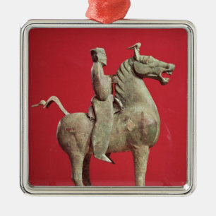 Man on horseback from Wu-wei, Kansu Metal Ornament