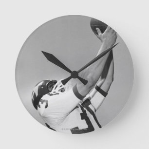 Man Playing Football Round Clock