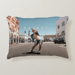 Man playing skateboard accent pillow