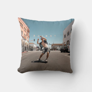 Man playing skateboard throw pillow