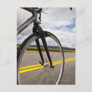 Man road biking at high speed POV Postcard
