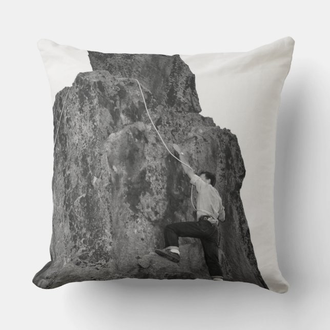 Man Rock Climbing Throw Pillow (Front)