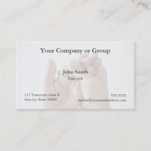 man squeezing his hand business card