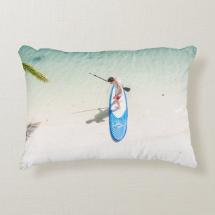 Man surfing on beach accent pillow