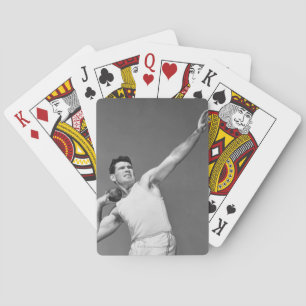 Man Throwing Shotput Playing Cards