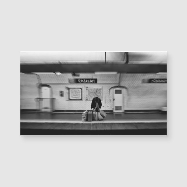 Man with shopping bags in subway (Chatelet) (Front)