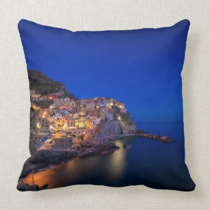 Manarola town in the Cinque Terre in the evening Throw Pillow