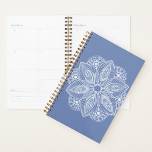 Mandala blanc exotique sur fond bleu