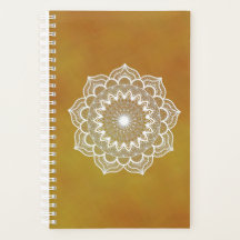 Mandala blanc sur fond doré
