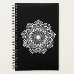 Mandala blanc sur fond noir