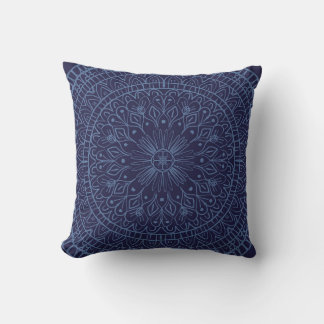 Mandala design on cushion in deep blue