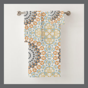 Mandala géométrique en orange, gris et bleu