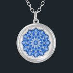 Mandala in blue Necklace<br><div class="desc">While the mandala originated in India, today the beauty of the modernized mandalas are suitable for many items in the home, as well as for decorations on clothing.
Note: there are a variety of products with this design suitable for your home or function, & mandalas in other colors.</div>