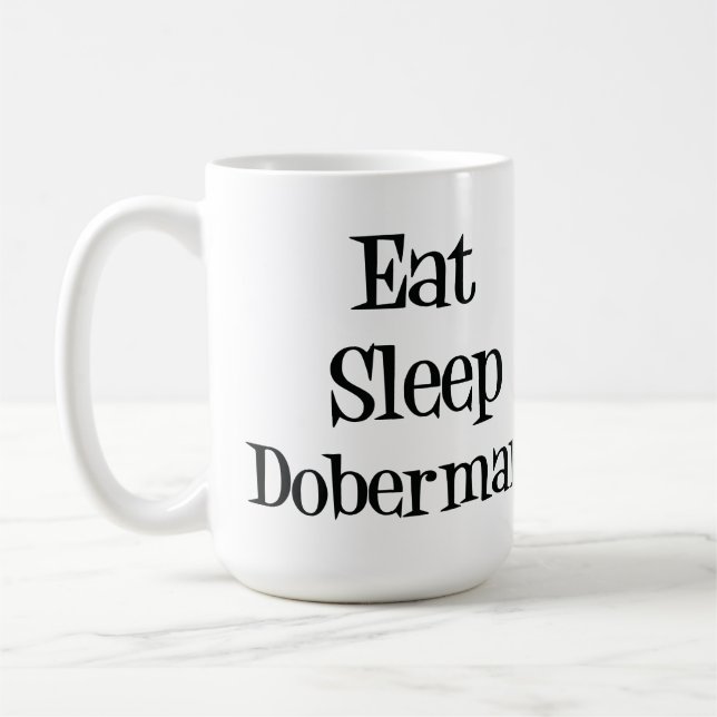 Mangez la tasse de dobermann de sommeil (Gauche)
