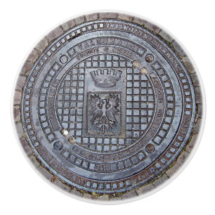 Manhole cover and cobblestone road ceramic knob