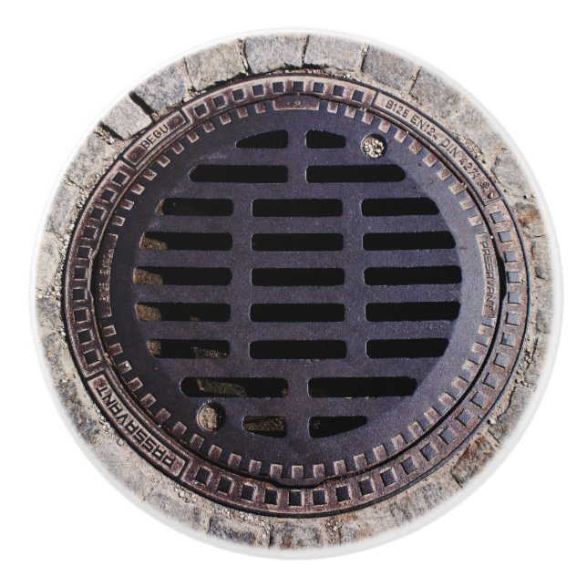 Manhole cover and cobblestone road ceramic knob (Front)