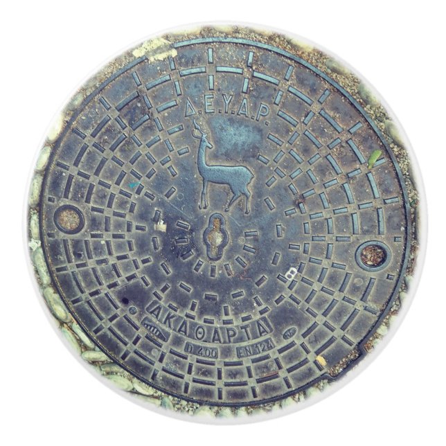 Manhole cover and cobblestone road ceramic knob (Front)