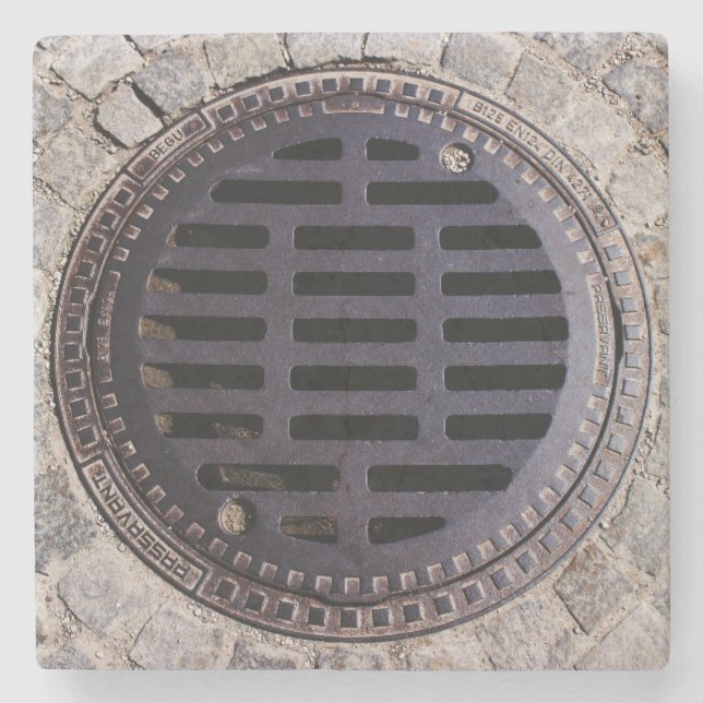 Manhole cover and cobblestone road stone coaster (Front)