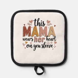 Manique Cette maman porte son coeur sur son manteau
