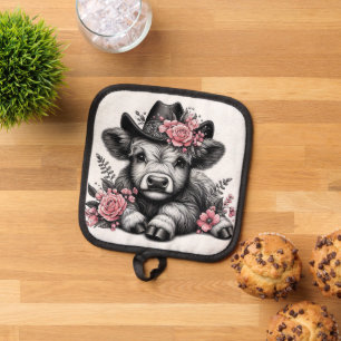 Manique Vache des Highlands avec chapeau et décoration flo