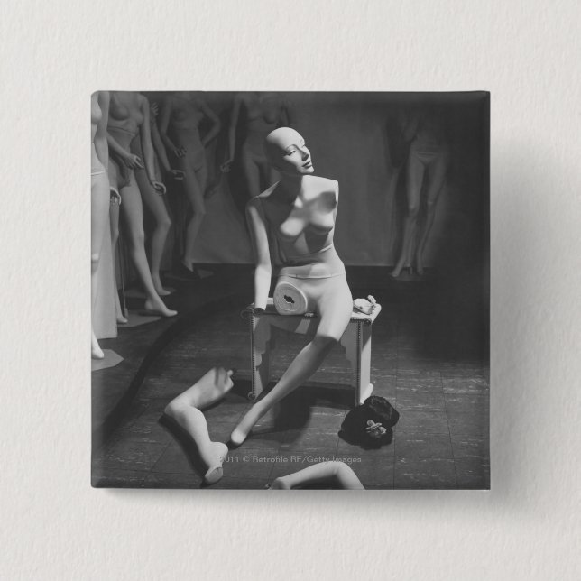 Mannequin with leg and arm removed 2 inch square button (Front)
