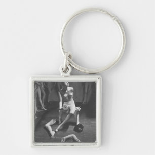 Mannequin with leg and arm removed keychain