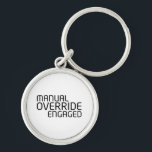 Manual Override Engaged Minimalist Typography  Keychain<br><div class="desc">A high-contrast physical trigger for your daily carry. This durable keychain ensures your access tools are organized under the "Manual Override" protocol at all times.</div>