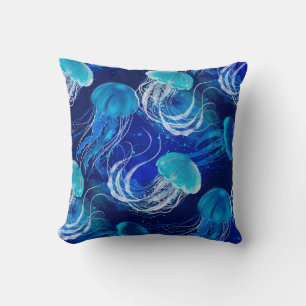 Many blue jellyfishes swimming underwater. Seamles Throw Pillow
